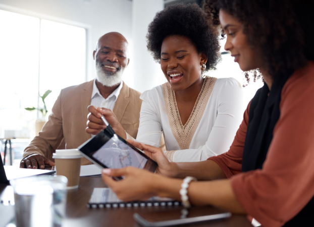 Nonprofit executive collaborating with a consultant on strategy and operations Nonprofit executive collaborating with a consultant on strategy and operations